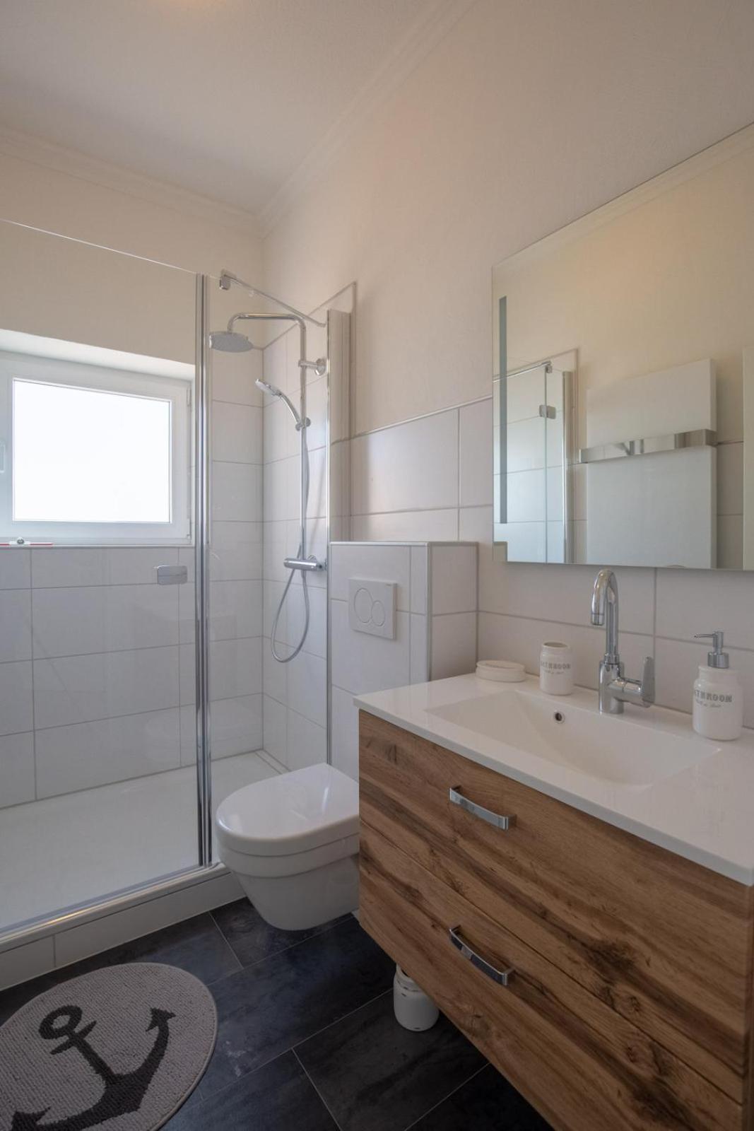 Apartamento Ankerplatz Ueber Dem Hafen-Pub Pellworm Exterior foto